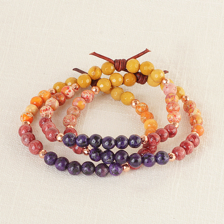 The Astronauts Wife Mini Bracelet Stack of Three, Collaboration with Stacey Morgan, 6mm yellow Mookaite, orange Sea Sediment Jasper, red Magnesite, purple Jasper, Rose Gold Accents, Leather Knot