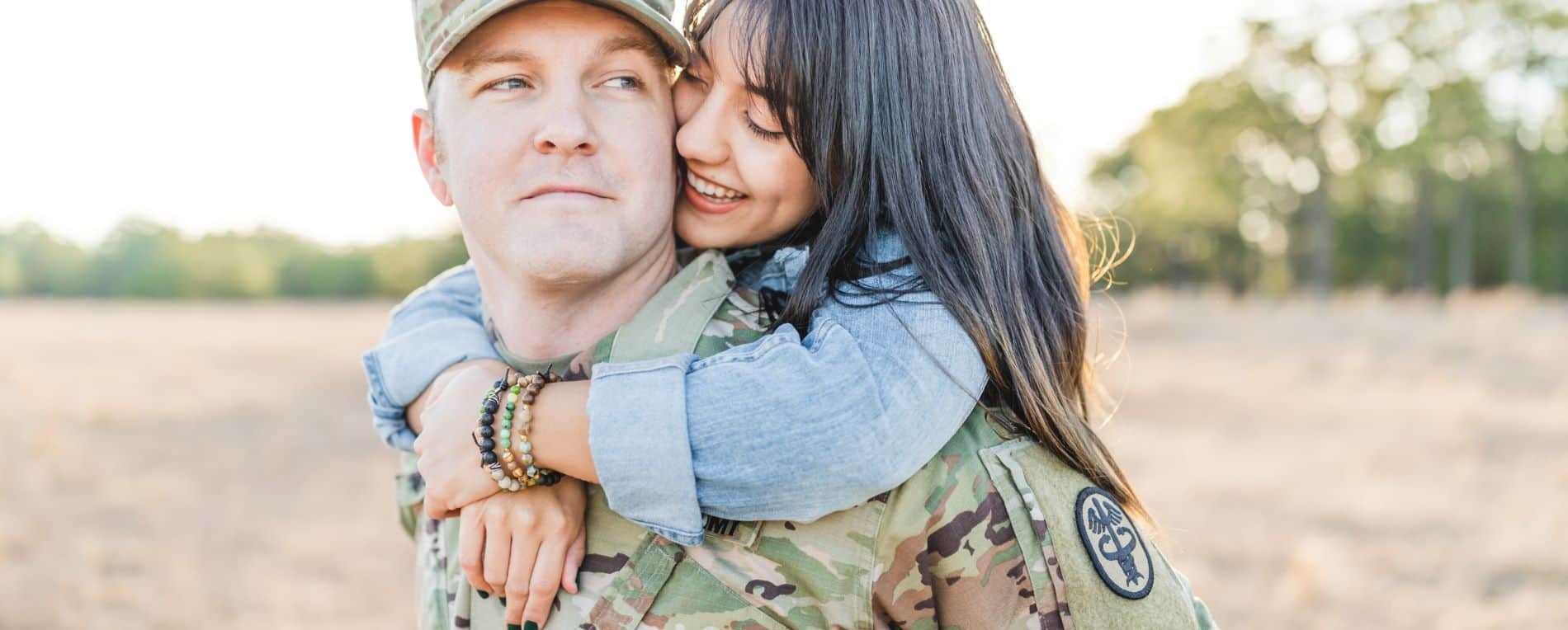 military couple embracing