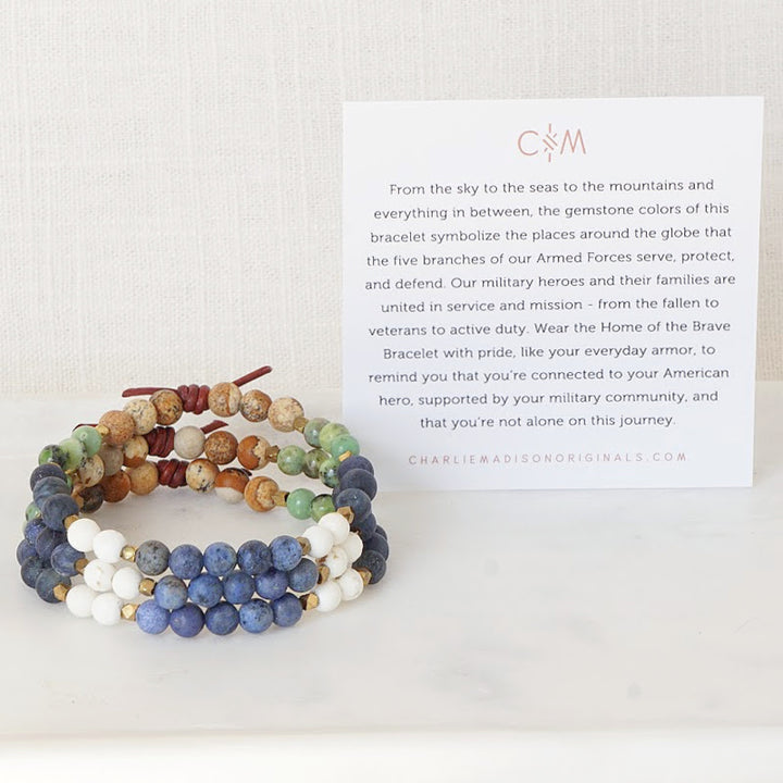 Home of The Brave Mini Bracelet Stack with Meaning Card - Our military heroes and their families are united in service and mission - from the fallen to veterans to active duty. Wear the Home of the Brave Bracelet with pride, like your everyday armor, to remind you that you’re connected to your American hero, supported by your military community, and that you’re not alone on this journey.