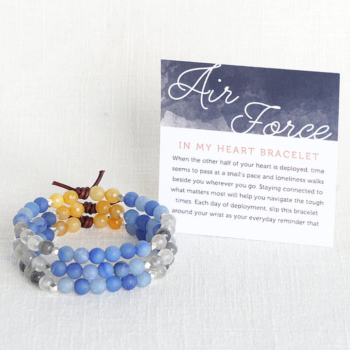 In My Heart Air Force Bracelet with Meaning Card - When the other half of your heart is deployed, time seems to pass at a snail’s pace and loneliness walks beside you wherever you go. Staying connected to what matters most will help you navigate the tough times. Each day of deployment, slip this bracelet around your wrist as your everyday reminder that your hero is always in your heart even though there are miles between you.