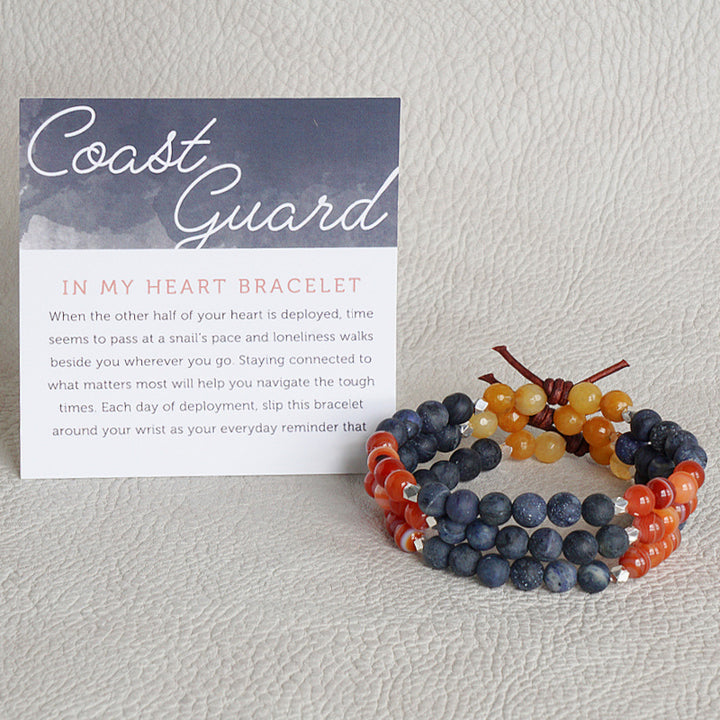 In My Heart Coast Guard Bracelet with Meaning Card - When the other half of your heart is deployed, time seems to pass at a snail’s pace and loneliness walks beside you wherever you go. Staying connected to what matters most will help you navigate the tough times. Each day of deployment, slip this bracelet around your wrist as your everyday reminder that your hero is always in your heart even though there are miles between you.