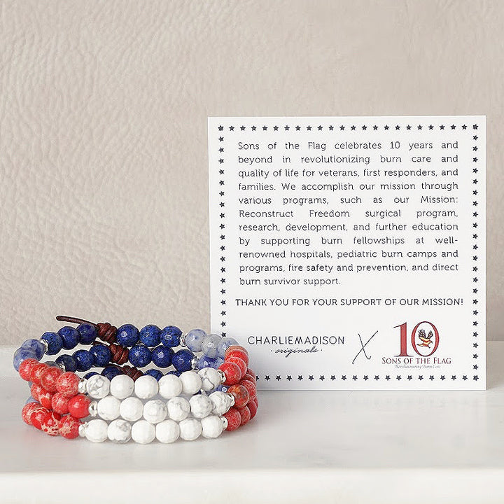 Sons of the Flag Mini Bracelet with Meaning Card - When someone suffers a severe burn injury, the after-effects are debilitating and generally last a lifetime. Sons of the Flag is so proud to revolutionize burn care for veterans, first responders, and families to improve their quality of life. Our hope is that you will wear this bracelet as a tribute to veteran and first responder burn survivors who risk their lives for our country and for our fellow men and women every day.