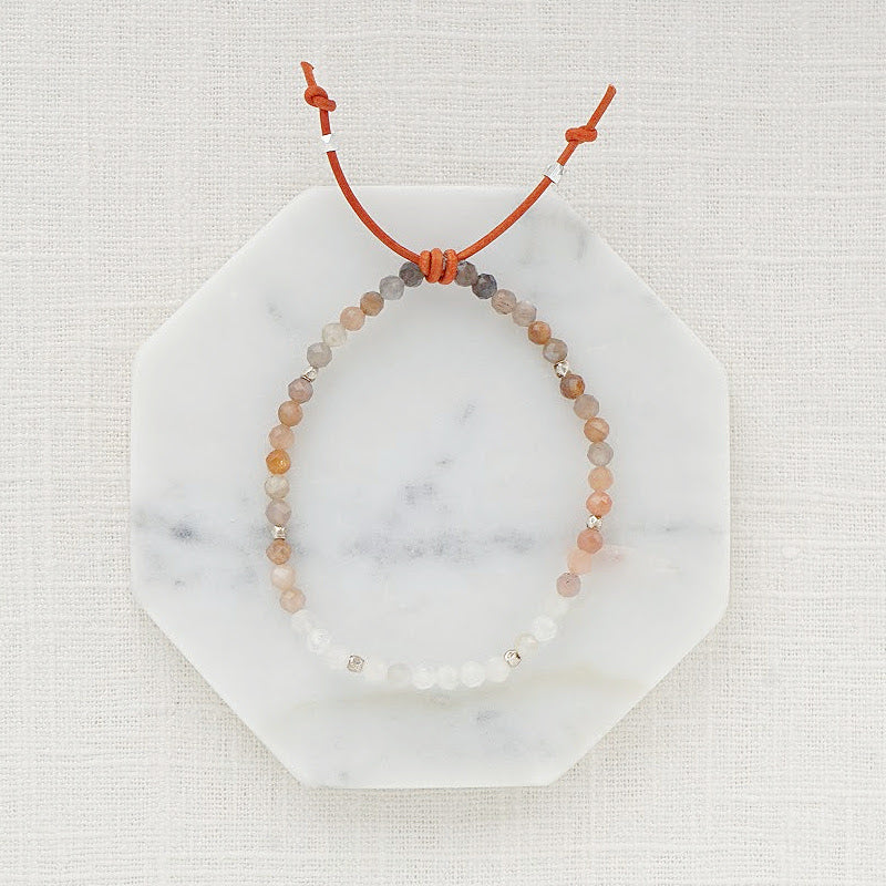 Tiny Mantras Bracelet – Peach Moonstone, 4mm Gemstones, Peach Moonstone, Silver Accents, Leather Knot