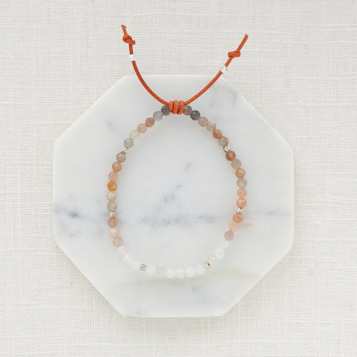 Tiny Mantras Bracelet – Peach Moonstone, 4mm Gemstones, Peach Moonstone, Silver Accents, Leather Knot