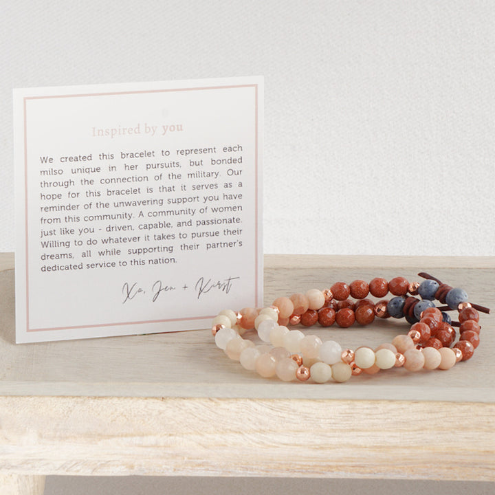 Wives of the Armed Forces Mini with Meaning Card - We created this bracelet to represent each milso unique in her pursuits but bonded through the connection of the military. Our hope for this bracelet is that it serves as a reminder of the unwavering support you have from this community. A community of women just like you - driven, capable, and passionate. Willing to do whatever it takes to pursue their dreams, all while supporting their partner's dedicated service to this nation.