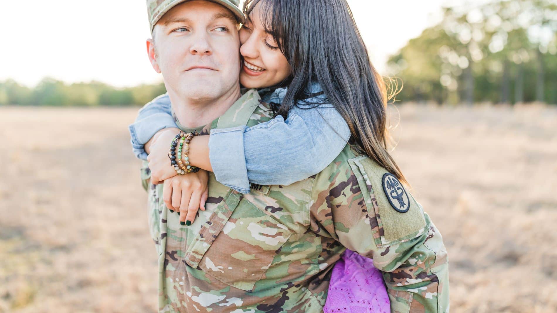 military couple embracing