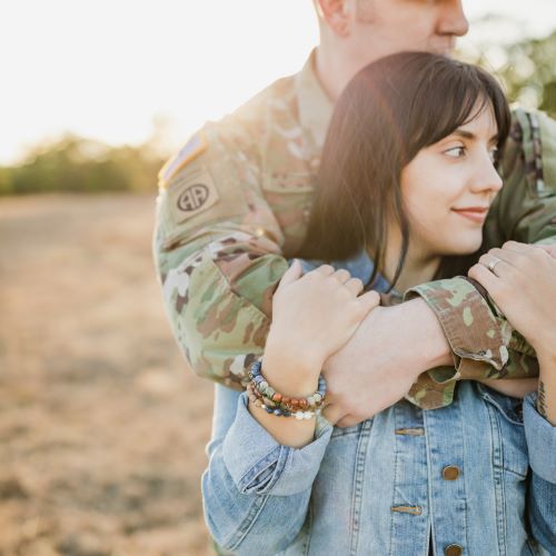 Soldier embracing his spouse