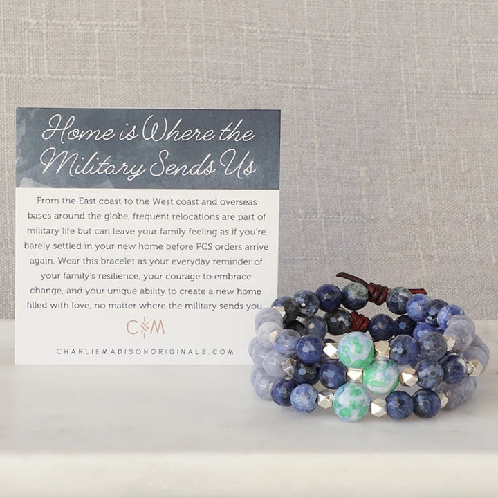 Home Is Where The Military Sends Us Bracelet with Meaning Card - From the East coast to the West coast and overseas bases around the globe, frequent relocations are part of military life but can leave your family feeling as if you’re barely settled in your new home before PCS orders arrive again. Wear this bracelet as your everyday reminder of your family's resilience, your courage to embrace change, and your unique ability to create a new home filled with love, no matter where the military sends you.
