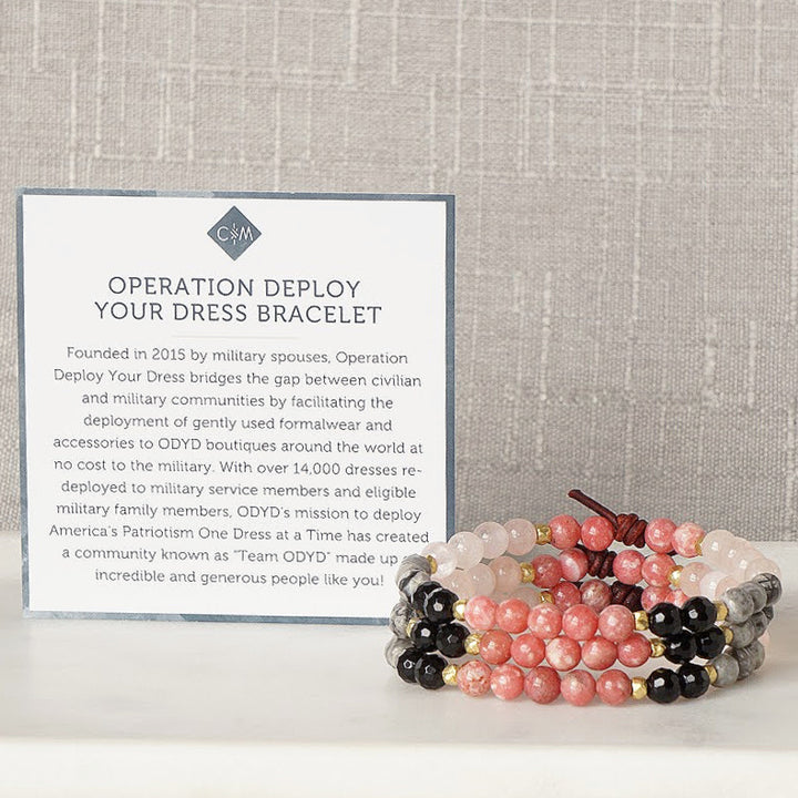 Operation Deploy Your Dress Mini Bracelet with Meaning Card - Founded in 2015 by military spouses, Operation Deploy Your Dress bridges the gap between civilian and military communities by facilitating the deployment of gently used formal wear and accessories to ODYD boutiques around the world at no cost to the military. ODYD's mission to deploy America's Patriotism One Dress at a Time has created a community known as "Team ODYD" made up of incredible and generous people like you!