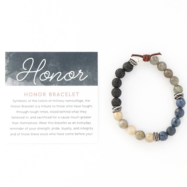 Honor Bracelet with Meaning Card - Symbolic of the colors of military camouflage, the Honor Bracelet is a tribute to those who have fought through tough times, stood behind what they believed in, and sacrificed for a cause much greater than themselves. Wear this bracelet as an everyday reminder of your strength, pride, loyalty, and integrity and of those brave souls who have come before you!