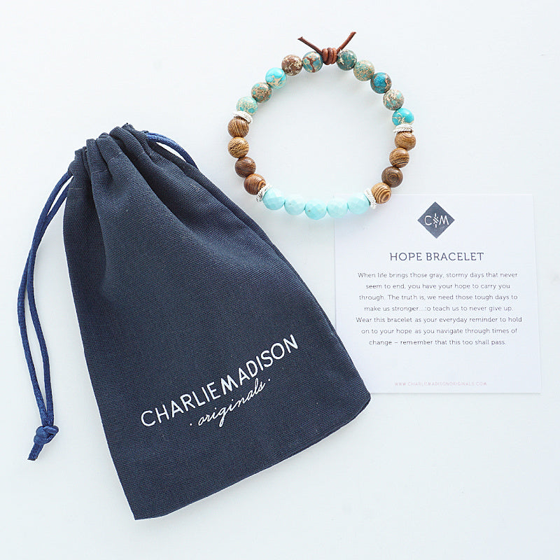 Hope Bracelet with Meaning Card and Linen Bag - When life brings those gray, stormy days that never seem to end, you have your hope to carry you through. The truth is, we need those tough days to make us stronger....to teach us to never give up. Wear this bracelet as your everyday reminder to hold on to your hope as you navigate through times of change – remember that this too shall pass.