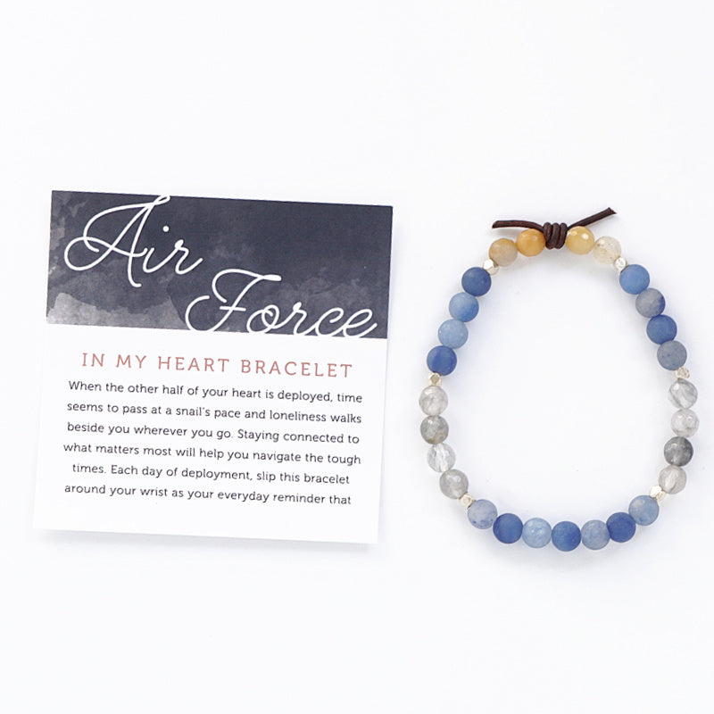 In My Heart Air Force Bracelet with Meaning Card - When the other half of your heart is deployed, time seems to pass at a snail’s pace and loneliness walks beside you wherever you go. Staying connected to what matters most will help you navigate the tough times. Each day of deployment, slip this bracelet around your wrist as your everyday reminder that your hero is always in your heart even though there are miles between you. 