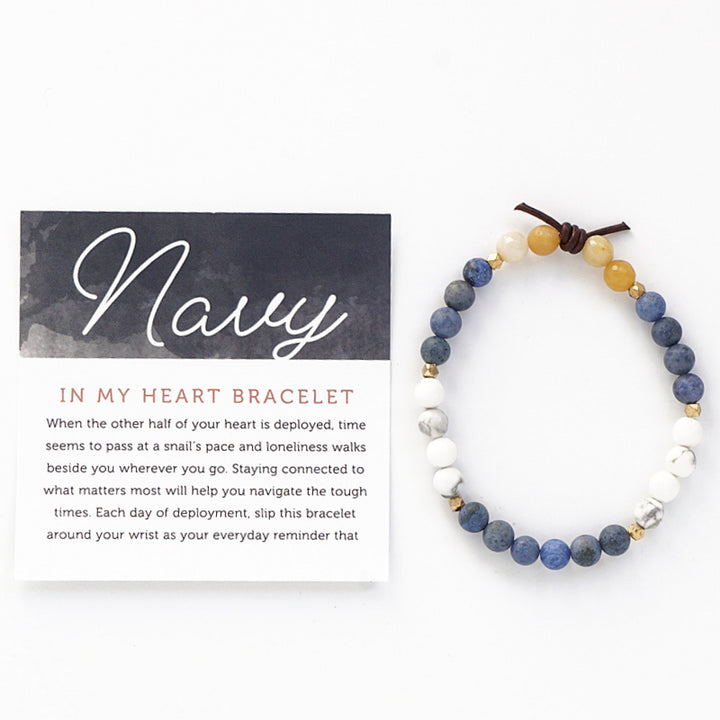 In My Heart Navy Bracelet with Meaning Card - When the other half of your heart is deployed, time seems to pass at a snail’s pace and loneliness walks beside you wherever you go. Staying connected to what matters most will help you navigate the tough times. Each day of deployment, slip this bracelet around your wrist as your everyday reminder that your hero is always in your heart even though there are miles between you. 