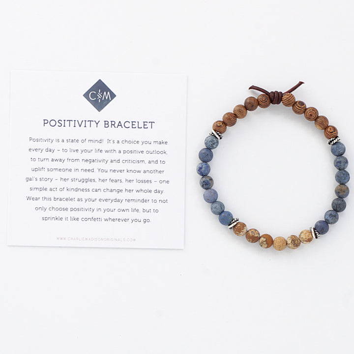 Positivity Mini Bracelet with Meaning Card - Positivity is a state of mind! It’s a choice you make every day – to live your life with a positive outlook, to turn away from negativity and criticism, and to uplift someone in need. You never know another gal’s story – her struggles, her fears, her losses – one simple act of kindness can change her whole day. Wear this bracelet as your everyday reminder to not only choose positivity in your own life, but to sprinkle it like confetti wherever you go.