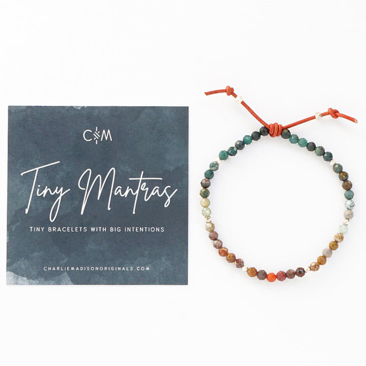 Tiny Mantras Bracelet – Ocean Jasper with Meaning Card - A tiny bracelet with big intentions! Made with pretty faceted multi-colored Ocean Jasper gemstones, this dainty everyday stacking bracelet will help you keep your favorite mantra top of mind as you move through your day.
